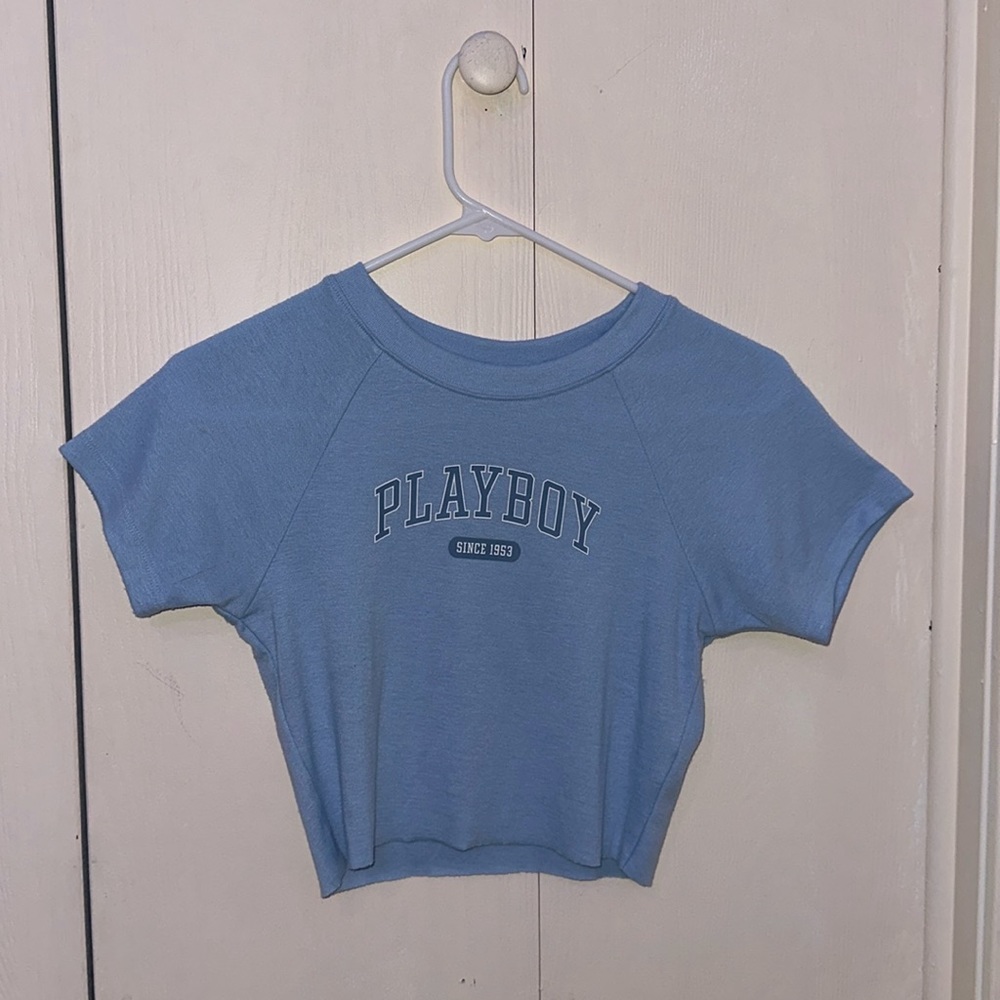 Cropped light blue playboy shirt from pacsun. Size small.